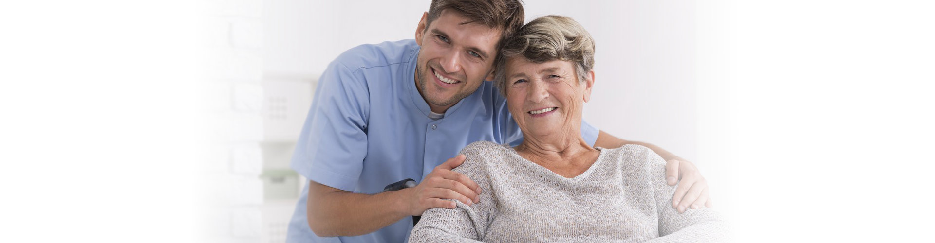 man and elderly woman smilling